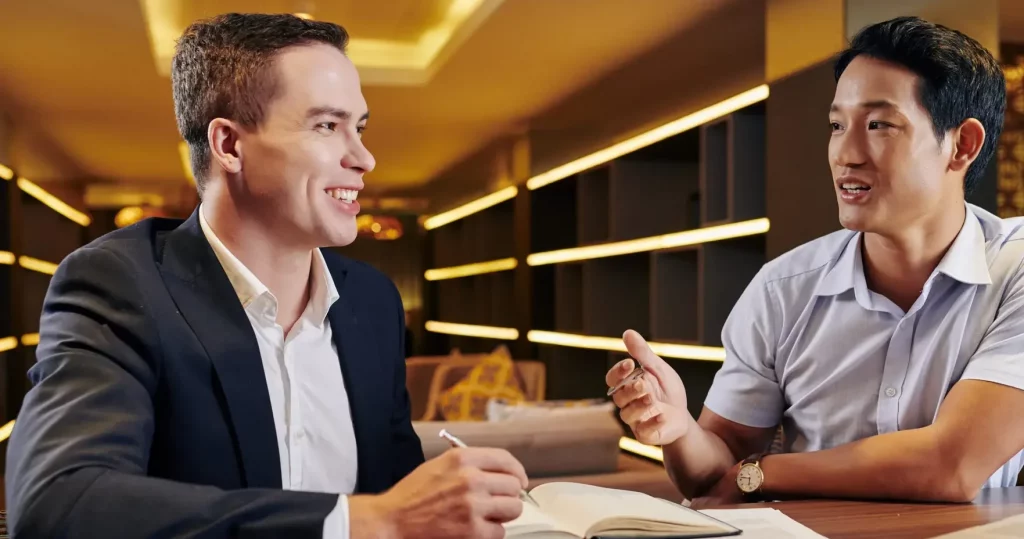 Business Coach meets with client in restaurant