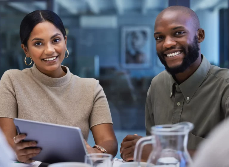 Two people sitting at a table doing career coaching