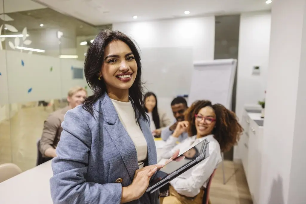 woman smiling in suit business