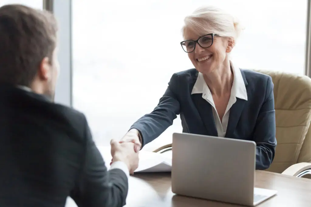executive coach woman meeting with client in office