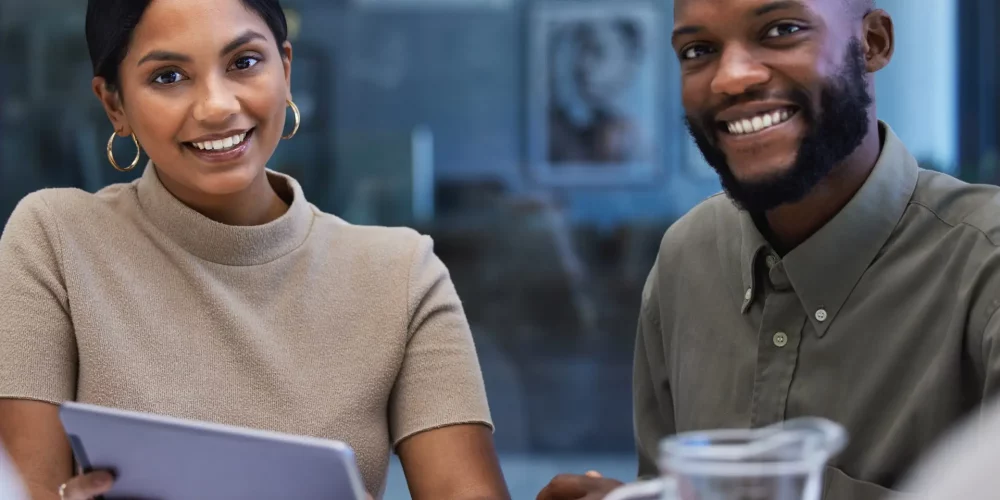 Two people sitting at a table doing career coaching