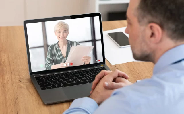 Unrecognizable man having videocall with woman his business partner, using laptop in office, cropped. Lady employee having business training online, business woman talking to partner online, collage